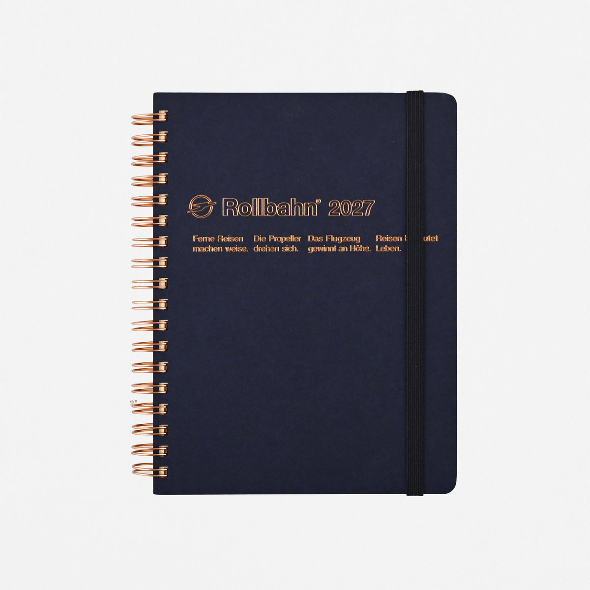 Rollbahn 2027 Homme planner in dark navy blue,  spiral-bound in antique brass with antique gold foil printing on the front cover 